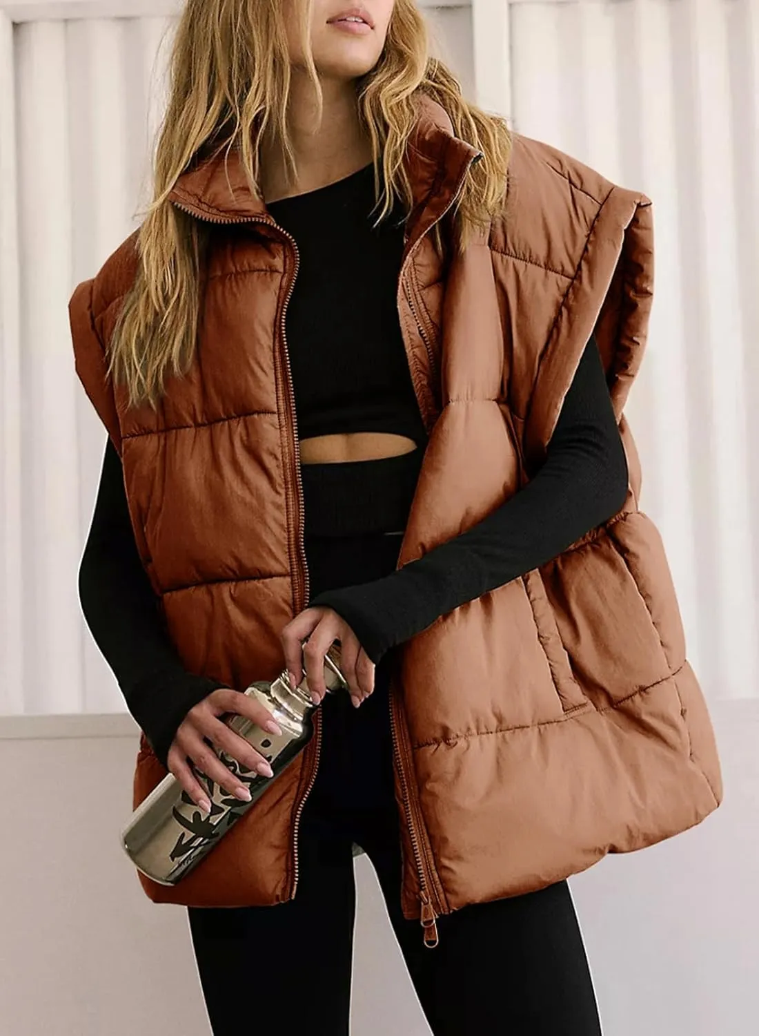 Dokotoo Women's Casual Winter Oversized Puffer Vest Stand Collar Flysleeve Insulated Padded Puffy Jackets Coat with Pockets